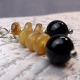 amber black earrings uk