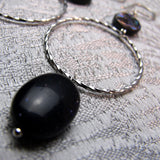 long hoop earrings with semi-precious beads