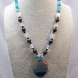 handmade blue bead necklace with blue semi-precious pendant
