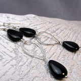 long black silver teardrop shaped earrings