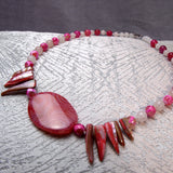 short pink bead necklace