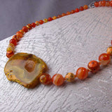 bold orange chunky statement necklace unique design