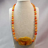 unusual handcrafted chunky orange semi-precious bead necklace