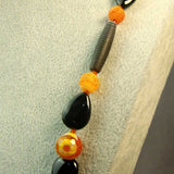 black orange semi-precious stone beads