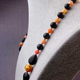 black orange beads