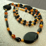 statement necklace long chunky black orange design