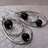 long drop hoop statement earrings unique design