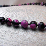 black pink beads