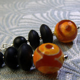 handmade black and orange bead earrings