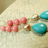 unique statement design, long drop earrings