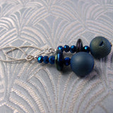 long blue earrings with blue semi-precious gemstones