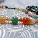 semi-precious stone beads set in long necklace design