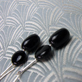 long black statement earrings