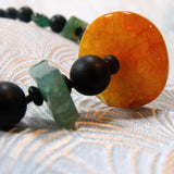 orange green necklace design
