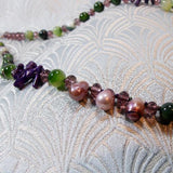 purple gemstone beads, green gemstone beads