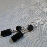 long black onyx earrings with a statement
