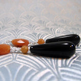 long black orange semi-precious earrings with statement