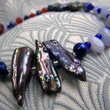 deep blue biwa pearls set in a semi-precious necklace