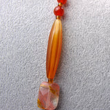 long semi-precious stone bead carnelian