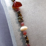 detail for brown longer length necklace