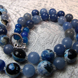 collection of blue semi-precious beads