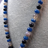 detail for semi-precious pendant necklace blue beads