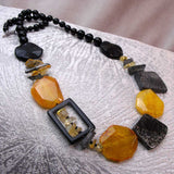 bold chunky black orange necklace handmade with a statement