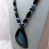 unique unusual statement necklace with chunky blue black semi-precious beads