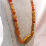unique statement necklace handmade from chunky orange semi-precious beads
