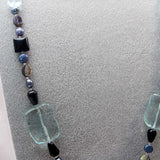 semi-precious beads in long necklace