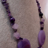 detail for chunky purple bead necklace