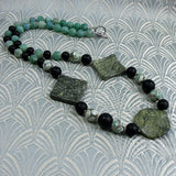 unusual handmade green necklace design