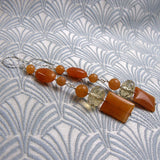 long orange gemstone statement earrings uk