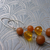 long handmade orange statement earrings