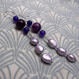 long purple gemstone statement earrings