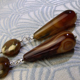 long brown semi-precious gemstone earrings with statement