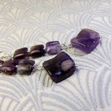 long purple gemstone earrings