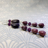 long gemstone earrings purple stones