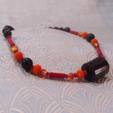 semi-precious stone necklace with coral and crystals
