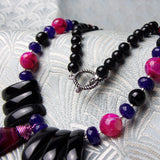 black pink necklace with gemstone pendant