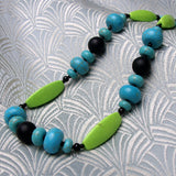 longer length gemstone necklace green in colour