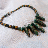 unique green gemstone necklace with a statement