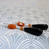 long black orange statement earrings